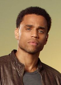 Michael Ealy
as Travis Marks
