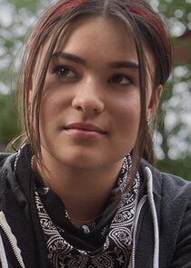 Devery Jacobs
as Elora Danan Postoak