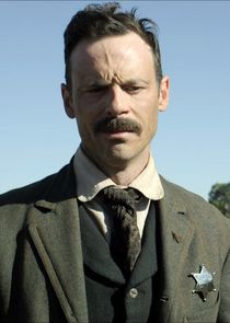 Scoot McNairy
as Sheriff Bill McNue