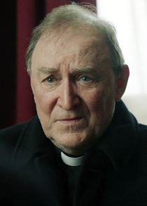 Dermot Crowley
as Father Dennis Chapman