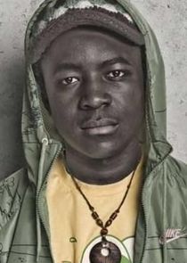 Merveille Lukeba
as Thomas Tomone