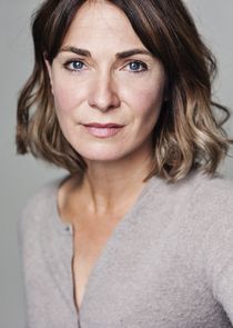 Nia Roberts
as Karina Bethell