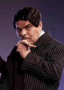 Luis Guzmán
as Gomez Addams