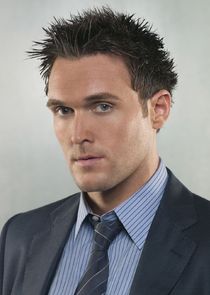 Owain Yeoman
as Wayne Rigsby