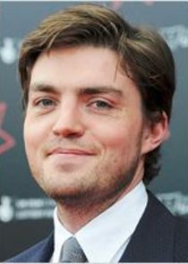 Tom Burke
as Dennis Rebrov
