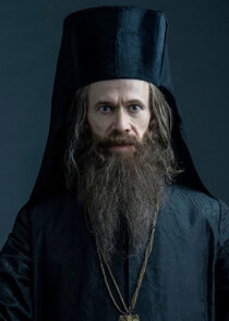 Adam Godley
as Archie